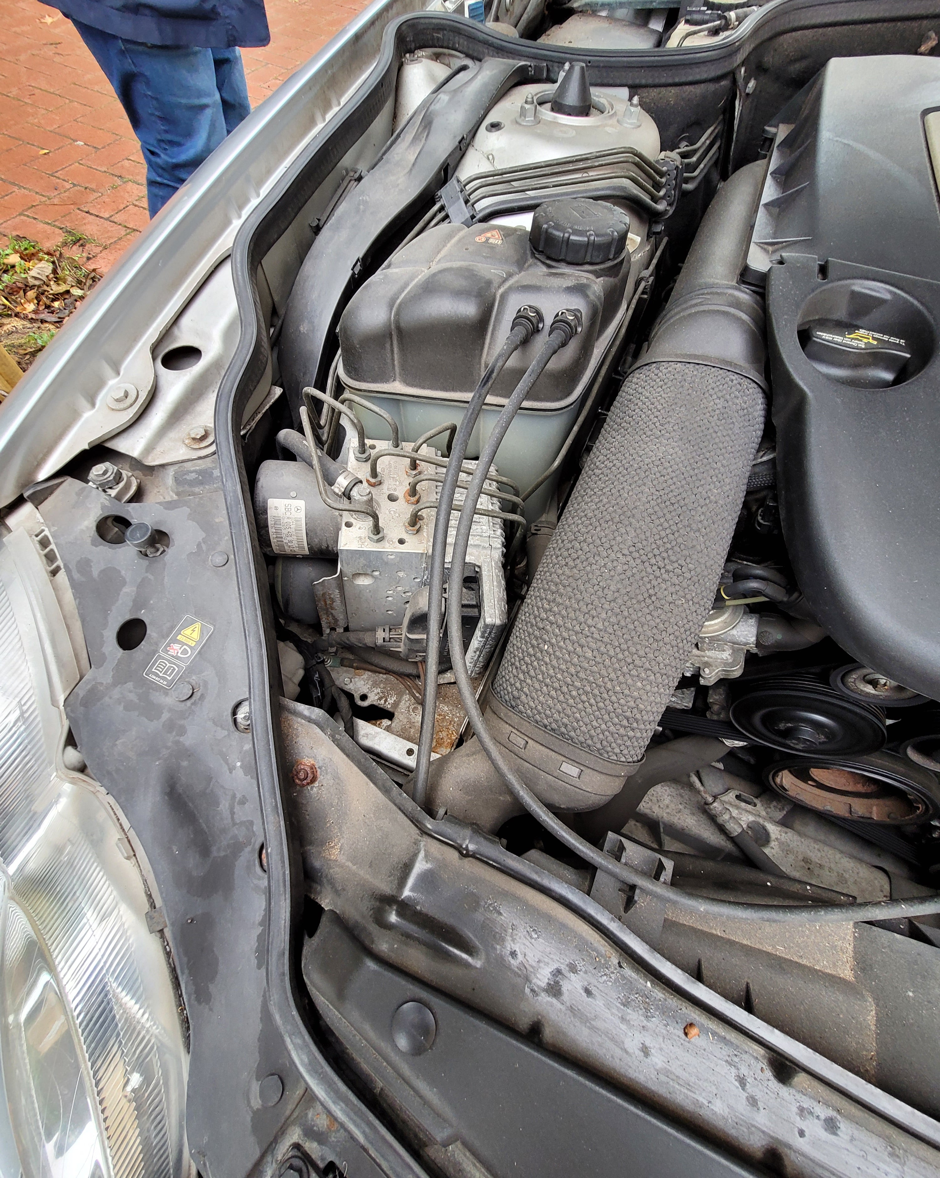 Car engine compartment with visible components